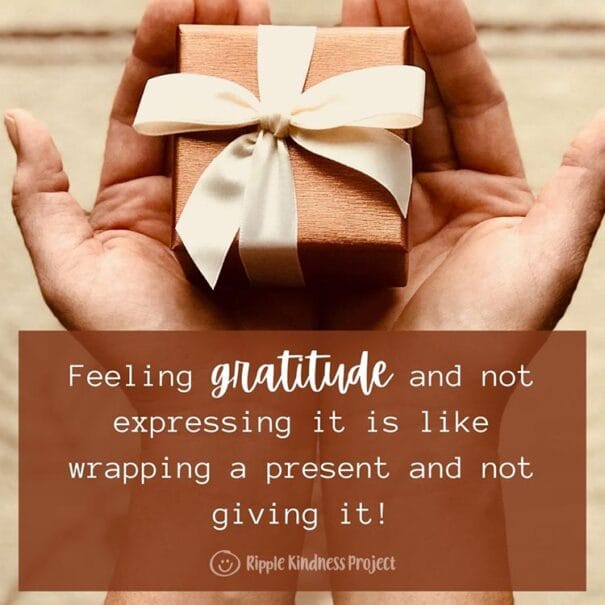 Image Of A Person Holding A Gift With A Ribbon In Their Hand With The Caption:feeling Gratitude And Not Expressing It Is Like Wrapping A Present And Not Giving It